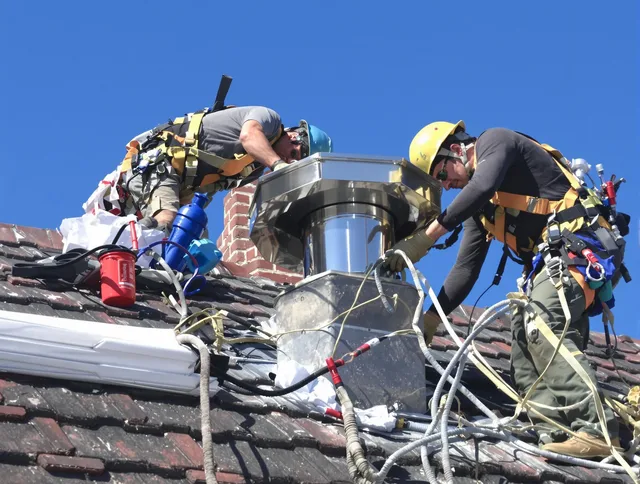 Protective chimney cap installed by Mount Holly Chimney Sweep in Mount Holly, NC