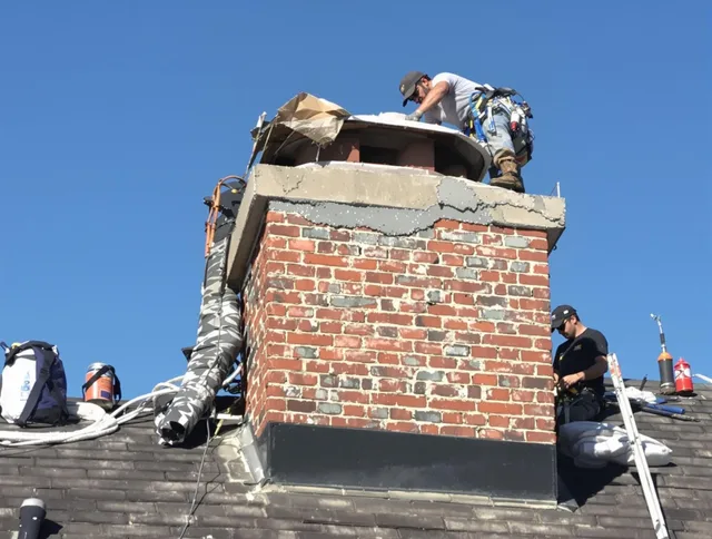 Mount Holly Chimney Sweep installing a custom chimney crown in Mount Holly, NC