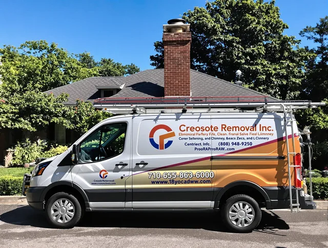 Mount Holly Chimney Sweep technician removing creosote safely in Mount Holly, NC